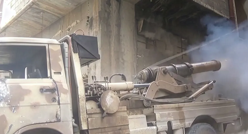 Improvised self-propelled artillery (of sorts) using a Syrian flatbed and a locally built Omar breech-loading cannon.