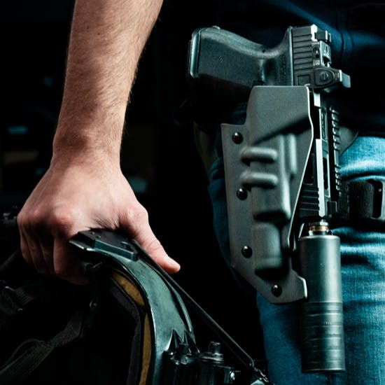RagnarokSD holster carrying a suppressed pistol