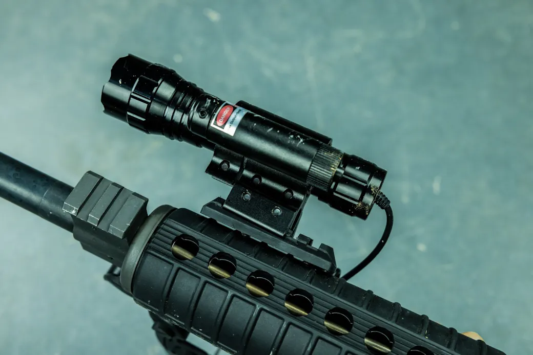 Picatinny section screwed into polymer handguard