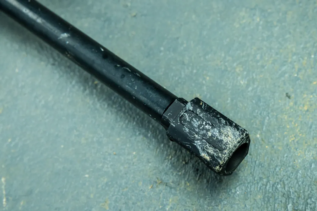 Poor quality blast chamber muzzle device