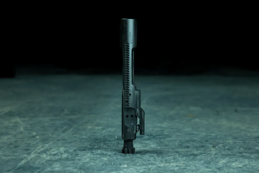 AR-15 bolt carrier group laid out for inspection