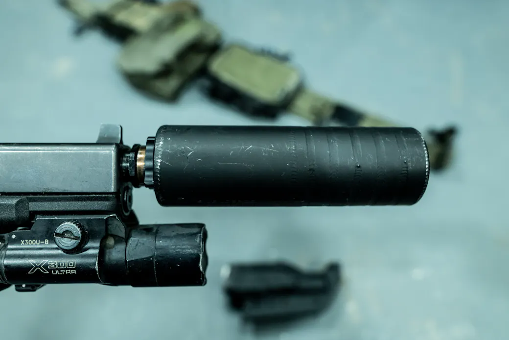 Trijicon suppressor height sights on pistol